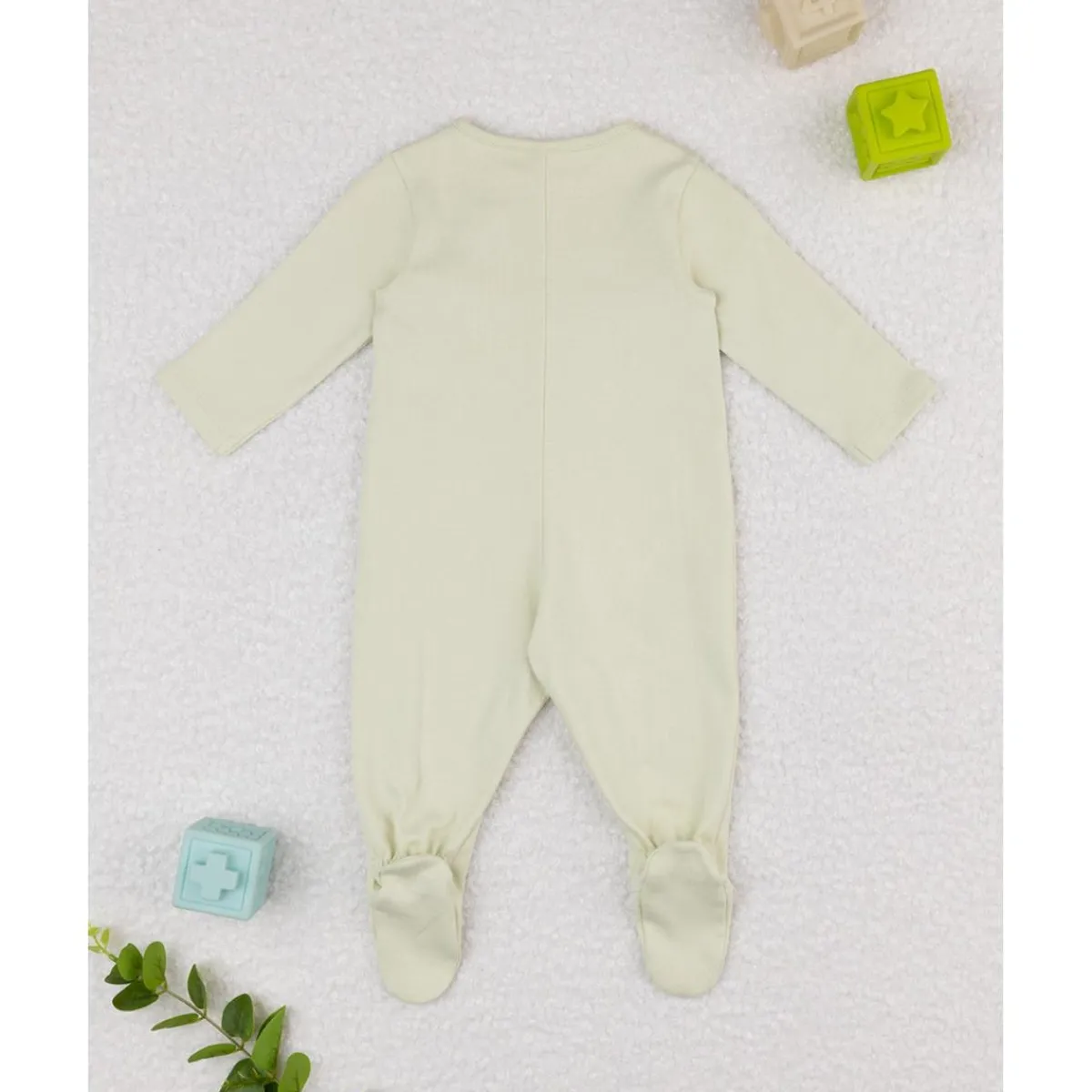 Mameluco verde con flores estilizadas*Prenatal Outlet