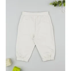 Pantalones niño beige estampado relieve*Prenatal Clearance